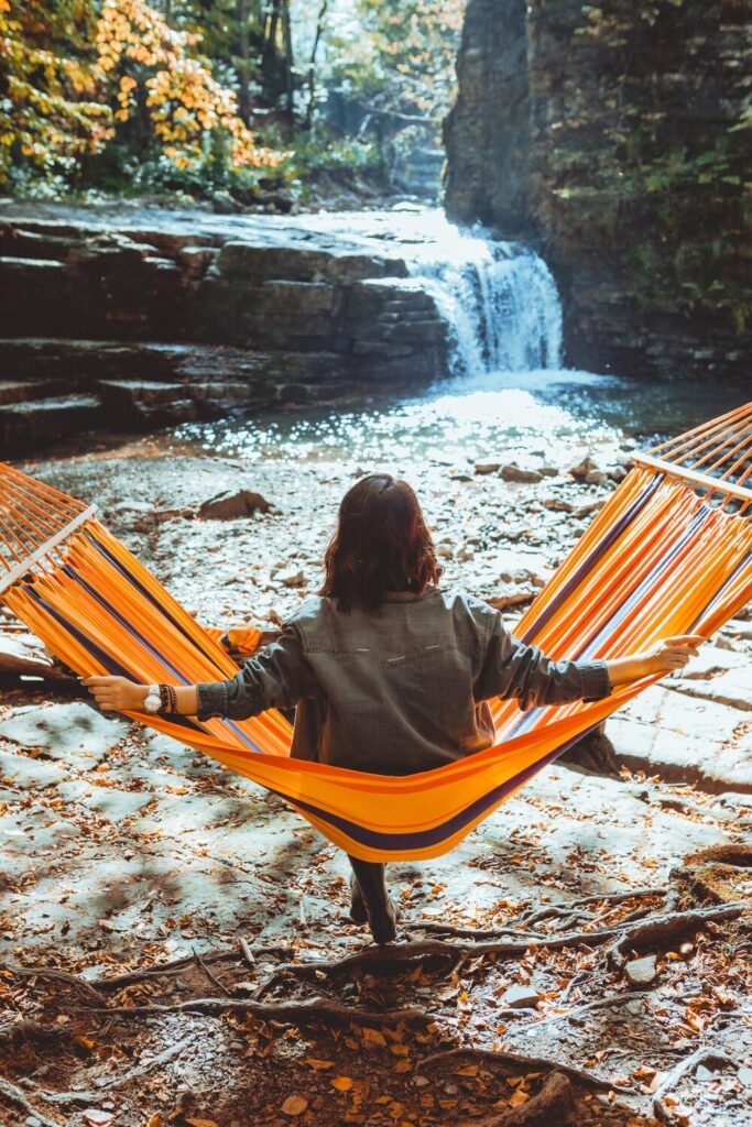 Woman laying hammock with view autumn waterfall 259348 13262