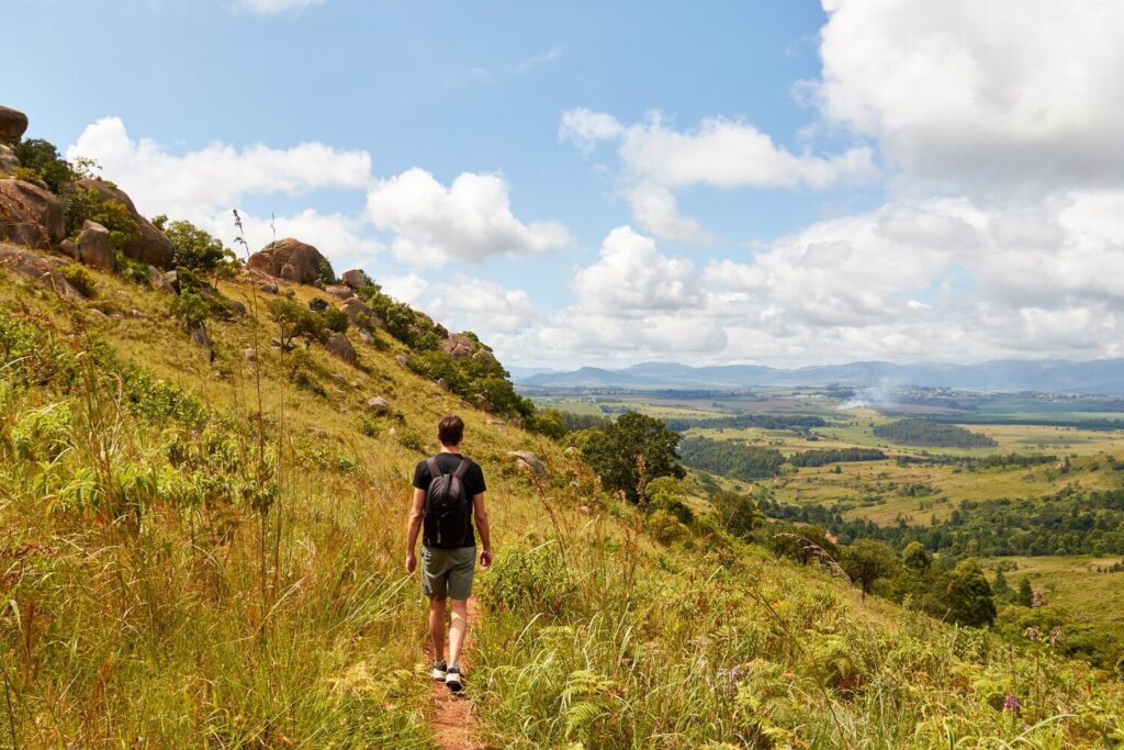 Young man walking mountains swaziland 1621946 679 Young man walking mountains swaziland 1621946 679